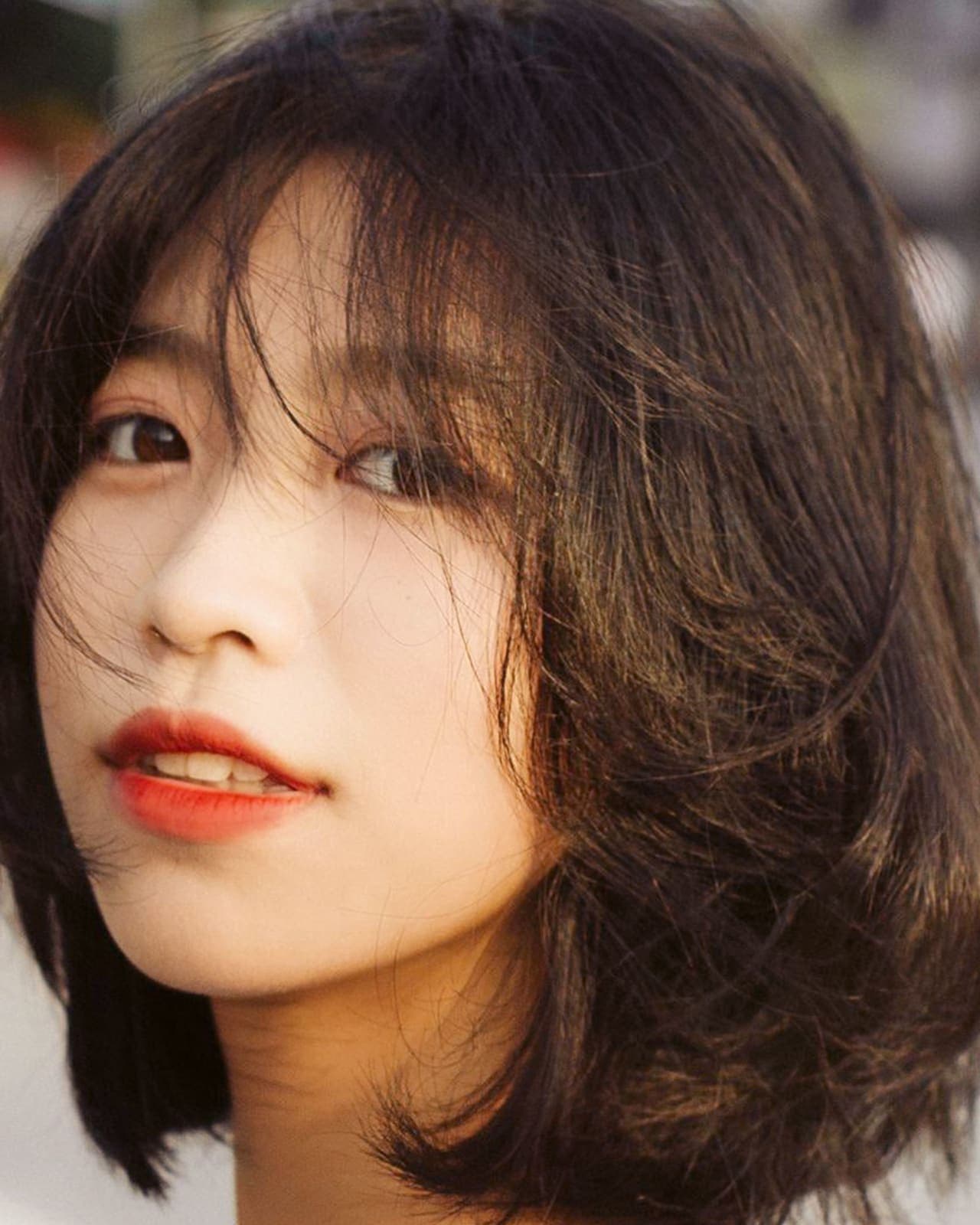 A woman with dry hair ends and oily scalp