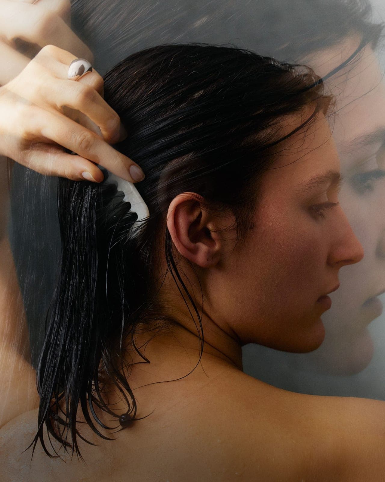 A woman with oily scalp